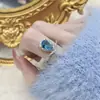 Set de Aguamarina Collar Anillo Pendientes Nuevo Gama Alta Lujo Ligero Cadena para Clavícula Colgante Moda Lujo Incrustado con Circonita