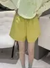 Shorts casuales rojos de pierna ancha para mujer, estilo fino de verano 2026, versión coreana, adelgazantes, versátiles pantalones de pierna ancha de línea A, shorts ajustados de cintura alta