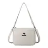 Bolso de mujer transfronterizo nuevo con un toque de alta gama, bolso de axila con patrón de lichi, simple y elegante, gran capacidad, bolso de hombro y cruzado de moda