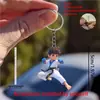 Novo Pingente de Menino Boxeador Cruz de Acrílico Decoração de Interior de Carro Espelho Retrovisor Pingente de Chaveiro