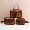 Bolsa de cosméticos transparente em PVC estilo Ins de viagem portátil à prova d'água bolsa de lavagem portátil bolsa de armazenamento para produtos de cuidados com a pele cosméticos