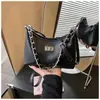 2026 Nova Bolsa de Ombro Estilosa e Casual Transfronteiriça Estilo Japonês-Coreano Nicho, Bolsa de Axila Formato Bolinho para Mulheres, Adequada para o Trabalho, Bolsa de Ombro e Transversal
