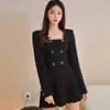 Comercio exterior ropa de mujer 2023 otoño moda coreana abrigo cruzado top temperamento falda corta plisada traje de dos piezas