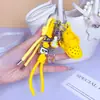 Sapatos Croc DIY Feitos à Mão Corda de Mão Fivela Pingente Miu Fofo Casal Chaveiro de Carro Bolsa Pequeno Pingente Atacado