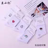 Novas meias de outono e inverno até a panturrilha para mulheres, com estilo preppy, design sem costura, material de algodão respirável e estampas de letras da moda, disponíveis para atacado