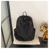 Mochila ligera de nailon impermeable estilo retro, color sólido, moderna, adecuada para ventas transfronterizas, gran capacidad, mochila de viaje, bolsa escolar casual