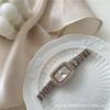 Reloj IEKE de lujo ligero de alta gama con correa de acero y diamantes para mujer, estilo ins, sencillo y elegante, reloj de cuarzo ovalado para mujer.