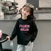 Camiseta de Manga Larga de Moda para Niña 2026 Primavera y Otoño Nueva Elegante Camiseta Infantil de Cuello Redondo Camiseta Básica de Algodón Puro para Niña Pequeña