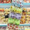 Novo e divertido grampo de cabelo de brinquedo de chá de leite com pérolas de morango para crianças com emoji engraçado e grampo de franja de chá de frutas