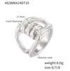 Anillo de estilo Hepburn con doble empalme geométrico, chapado en acero de titanio y oro de 18 quilates con incrustaciones de diamantes, estilo Joker, venta al por mayor