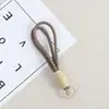 Lanyard de Teléfono Móvil de Doble Hilo Creativo de Moda Llavero Tejido a Mano Accesorio de Teléfono Móvil Multifuncional Simple Versátil Venta al por Mayor