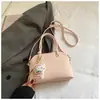 Bolsa Feminina de Nicho de Luxo 2026 Novo Estilo Coreano Simples Moda Ombro Transversal Feminina Bolsa de Mão de Grande Capacidade Tendência