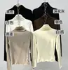Camiseta interior de cuello de oreja de madera para mujer estilo 2026 primavera y otoño cuello alto blanco estilo Chanel ropa interior otoño e invierno top de cuello alto ajustado