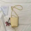 Shuai Mi Home Bolso de Mujer de Nicho Estilo Coreano de Alto Valor Modelo Nuevo 2026 Bolso de Hombro Tipo Cubo Simple Bolso Cruzado de Moda para el Trabajo
