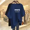 Camiseta de Manga Corta Estilo Nuevo Comercio Exterior 2026 para Mujer, Holgada Talla Grande, Adelgazante, Cubre Vientre, Top Estampado de Media Manga