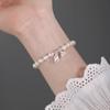 Novo bracelete de Lótus feminino moderno simples para amigas bracelete de pérola nicho retrô bracelete retrátil TikTok atacado