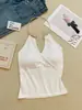 Top regata europeu e americano de nicho sexy com decote U profundo e costas abertas, metalizado, alça no pescoço, sem mangas, design justo, senso de temperamento, camisola