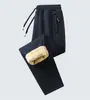 Edición Europea TransfronterizaPantalones Deportivos de Lana de Cordero Cálidos para Hombre, Pantalones Forrados de Felpa para Otoño e Invierno, Nuevo Estilo Engrosado, Corte Holgado