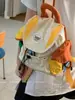Mochila Escolar Colorida Contrastante da Moda e Fofa para Estudantes Mulheres 2025 Nova Mochila Casual Lona de Grande Capacidade Bolsa de Viagem