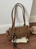 Bolsa de almohada estilo Maillard de diseño de nicho transfronterizo para mujer, nueva para Otoño/Invierno 2026, gran capacidad, para el trabajo, de un solo hombro, para llevar debajo del brazo