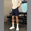 Shorts Estilo Americano Juvenil para Hombre Verano 2026 Nueva Marca de Moda Pantalones de Cinco Puntos Shorts Sueltos Estilo Masculino Verano