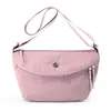 Bolsa de alta gama tipo dumpling, bolsa de viaje pequeña impermeable y ligera, bolso de hombro pequeño súper popular 2026, bolso cruzado pequeño de verano para mujer