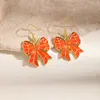 Pendientes de serie de baloncesto europea y americana transfronterizos, tachuelas de baloncesto con forma de lazo de corazón de madera, accesorios para orejas deportivos para fans al por mayor