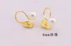 Pendientes de perlas de estilo retro frío, de alta gama, con clip de oreja de perla de imitación simple, sin agujeros, con placa de mosquito.