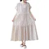 Foto real de vestido de algodón 2026 talla grande de verano estampado holgado adelgazante de manga corta con un ambiente artístico y relajado