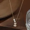 Novo Estilo Primavera e Verão Banhado a Ouro Real Zircônia Micro-Incustada Corrente de Clavícula Personalizada para Mulheres, Colar de Urso Pedra Olho de Gato de Alta Qualidade Atacado