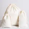 Suministro de fábrica esta bolsa de algodón blanca con cordón bolsa de almacenamiento bolsa de maquillaje para estudiantes