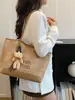 Bolsa Tote Grande de Gran Capacidad para Mujer Estilo Fresco 2026 Nueva Simple Cuadros Versátil para Viajar al Trabajo Hombro Axila Transversal