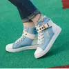 Zapatos de lona de caña alta para mujer de primavera y otoño, zapatos de estudiante, versión coreana de velcro, planos, casuales, zapatillas de skate, zapatillas blancas pequeñas, zapatillas de skate, venta al por mayor