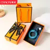 Chaveiro de anel de aperto criativo transfronteiriço para alívio de estresse, mini treinador de dedos colorido, dispositivo de aperto para alívio de estresse, pingente de mochila