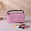 Nuevo neceser tipo bolso de mano de camelia, diseño apto para viajes, bolsa de almacenamiento de alta gama para cosméticos, labiales y llaves