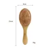 Pente de massagem com almofada de ar de bambu, uma ferramenta de modelagem de cabelo econômica e prática para uso doméstico, projetada para alisar, dar volume e realçar os cabelos. Apresenta uma base de bambu e uma almofada de ar de alta resiliência