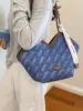 Bolso de mujer transfronterizo, versión coreana, bolso de hombro casual de color liso en bloque, nuevo modelo 2026, bolso tote de gran capacidad para el trabajo, bolso de mano