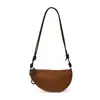 Nova bolsa de chifre da moda de nicho estilo coreano, bolsa de bolinho de cor sólida, bolsa de ombro, bolsa de ombro estilosa casual para trabalho e trajeto