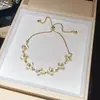 Pulsera Flor de Piedra Ojo de Gato Electrochapada en Oro Real de 14K, Única y Exquisita, Lujo Ligero, Gama Alta, Joyería de Mano Elegante