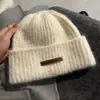 Chapéus de tricô para atacado de outono e inverno, feitos sob medida na fábrica de origem, chapéus para frio com circunferência de cabeça grande, chapéus slouch à prova de vento estilo coreano, chapéus protetores de orelha