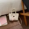Bolso de Mano de Nicho de Comercio Exterior de Gama Alta para Mujer, Nuevo Bolso Cruzado tipo Cubo de Hombro para Viaje Primavera/Verano 2026