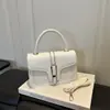 Otoño 2026 Nueva Moda Texturizada Moderna Cuadros Simple Elegante Versátil Hombro Cruzado de Mano Pequeña Cuadrada
