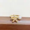 Anillo de Estrella de Mar Microincrustado Zirconia Perla Soporte Vacío de Moda Elegante Tendencia Versátil Exquisito Lujo Accesible Anillo Ajustable para Mujeres