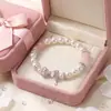 Pulsera de Perlas de Cristal Rosa con Lazo y Cuentas para Mujer, Cuentas de Mariposa Rosa Melocotón, Joyería de Pulsera de Cristal de Lujo Ligero Princesa Fugitiva