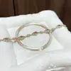"Flor de Seda Año tras Año" Pulsera Esmaltada Nueva Pintada en Oro Estilo Chino para Mujer, Joyería de Diseño de Lujo Ligero de Nicho de Gama Alta