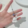 Lindo Perro Osito de Resina Estéreo Flocado Dibujos Animados Colgante Pequeño Hueso de Cerámica Llavero DIY Accesorios para Joyería Tendencia D