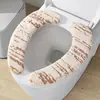 Funda para asiento de inodoro, tipo adhesivo, para uso doméstico, impermeable, adecuada para otoño e invierno, diseño ligero y lujoso, almohadilla de felpa a rayas engrosada para asiento de inodoro