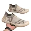 Nuevos zapatos de lona para hombre 2026 primavera-verano zapatos con panel de malla transpirables versátiles zapatos para hombre estilo coreano modernos mocasines slip-on