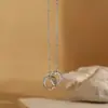 Colar de aço titânio de anel duplo Love 2023 feminino Novo pingente de diamante 18K Light Luxury Niche High-grade Clavícula Chain