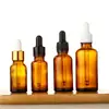 Em estoque, à prova de luz, frascos de âmbar de 5ml e 10ml para óleos essenciais, frascos conta-gotas de vidro, frascos dosadores cosméticos, pequenos frascos de âmbar vazios